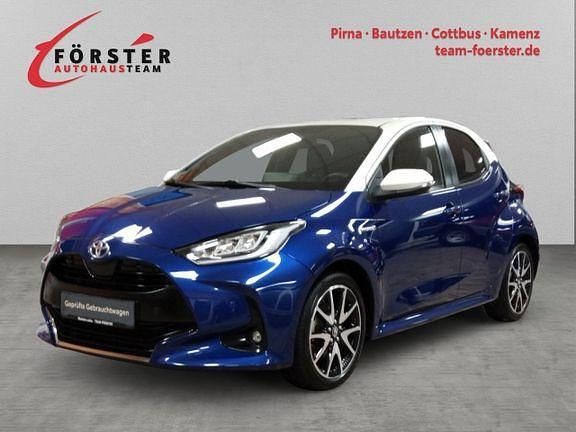 Nachtblau mica metallic, dach weiss Gebraucht 2021 Toyota Yaris Hybrid Style | 18.730 € (Guter Preis) - Bild 1/4