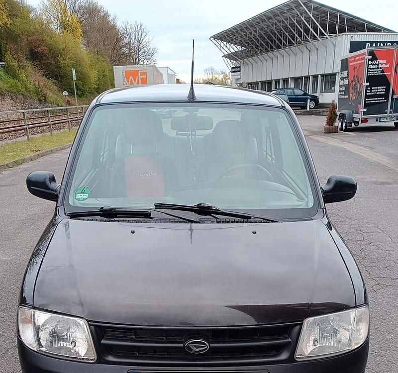 Gebraucht Daihatsu Cuore 56 PS (41 kW) 1999 Schwarz Kleinwagen