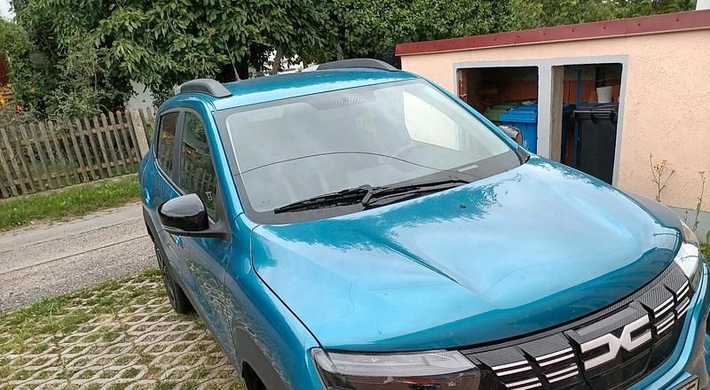 Blau Gebraucht 2022 Dacia Spring Essentiel Kleinwagen | 11.990 € (Fairer Preis) - Bild 1/4