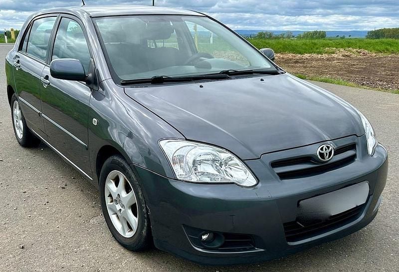 Grau Gebraucht 2005 Toyota Corolla Limousine | 3.299 € (Fairer Preis) - Bild 1/4