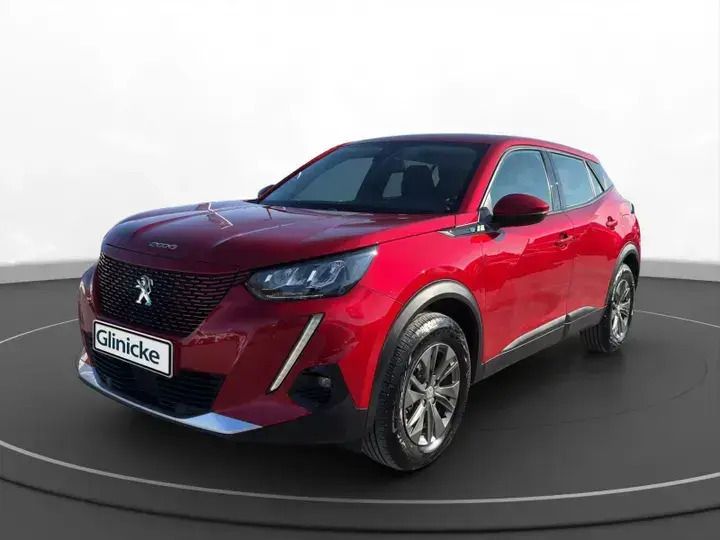 Elixirrot Gebraucht 2022 Peugeot e-2008 Active SUV | 16.990 € (Guter Preis) - Bild 1/3