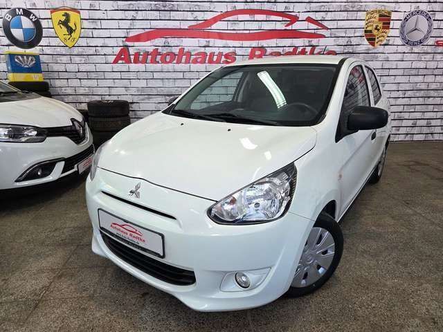 Weiß Gebraucht 2015 Mitsubishi Space Star Diamant Edition Kleinwagen | 4.990 € (Fairer Preis) - Bild 1/4