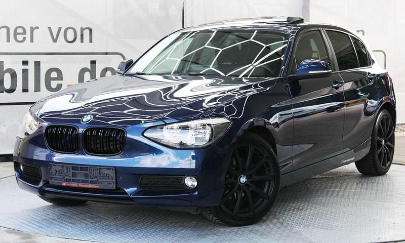 Blau Gebraucht 2011 BMW 116 Sport Line Kleinwagen | 7.950 € (Fairer Preis) - Bild 1/4