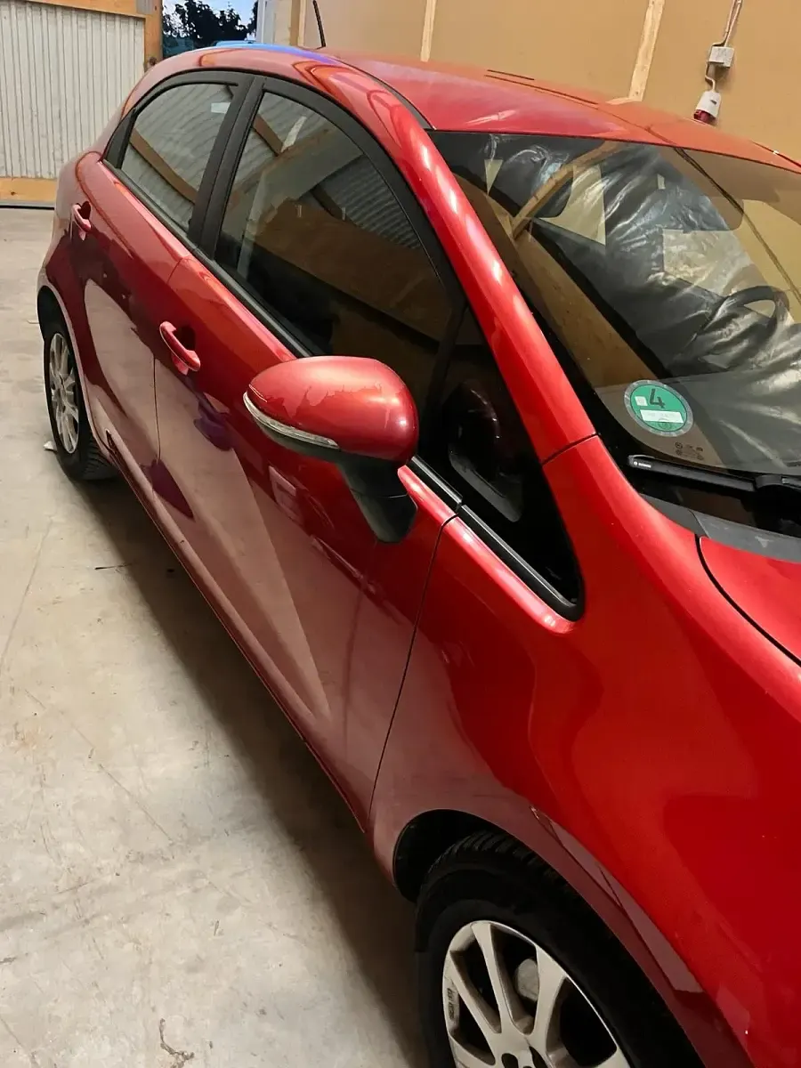 Gebraucht Kia Rio 90 PS (66 kW) 2012 Rot Kleinwagen