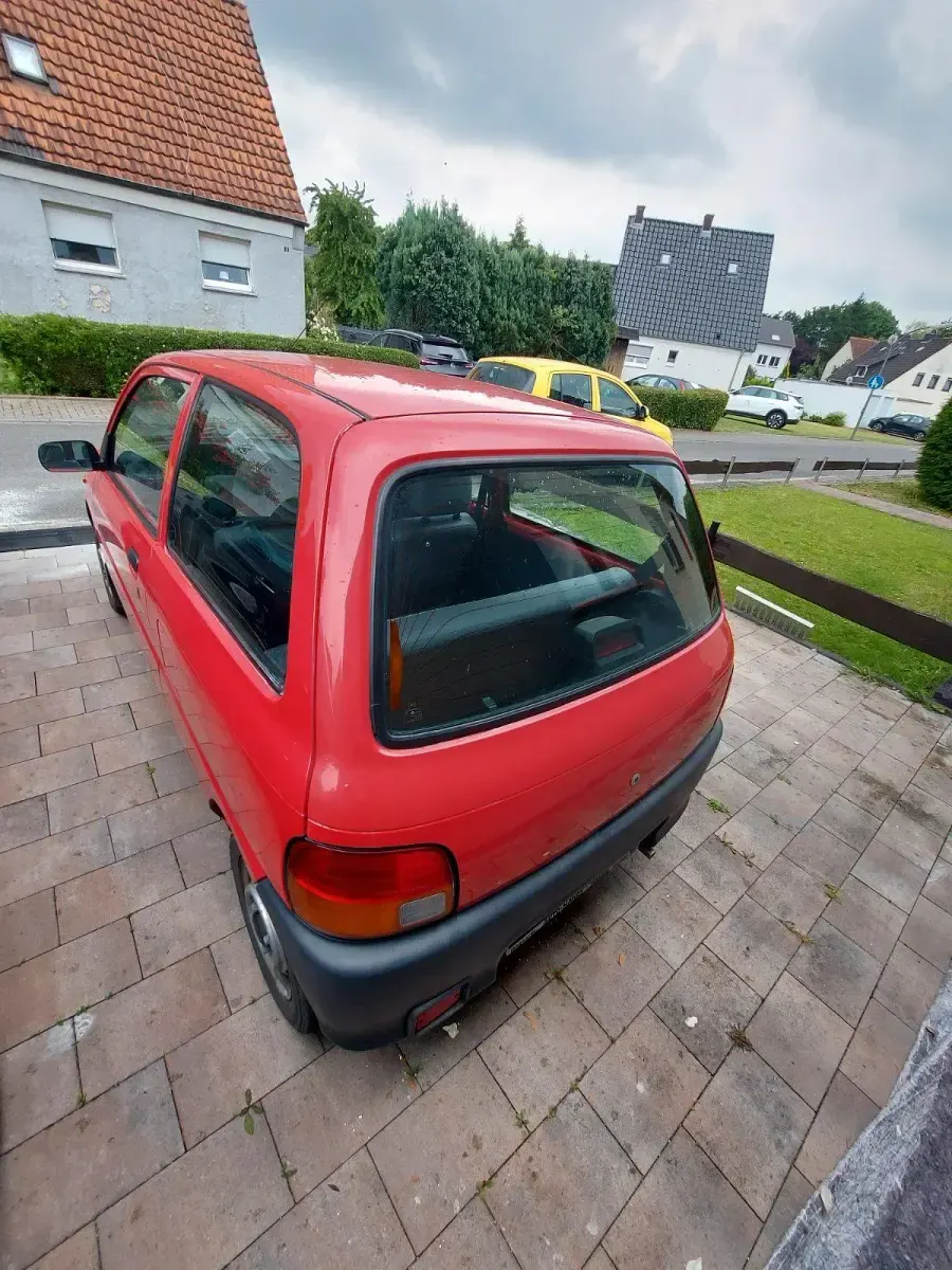 Gebraucht Daihatsu Cuore 42 PS (30 kW) 1998 Rot Kleinwagen