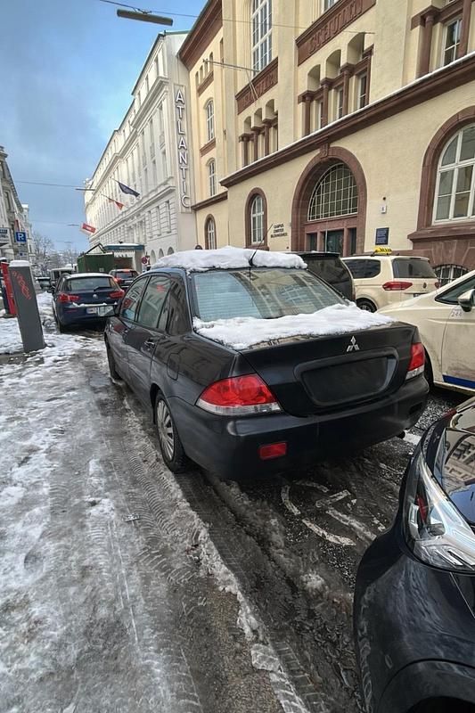 Gebraucht Mitsubishi Lancer Comfort Edition 98 PS (72 kW) 2005 Schwarz Kombi