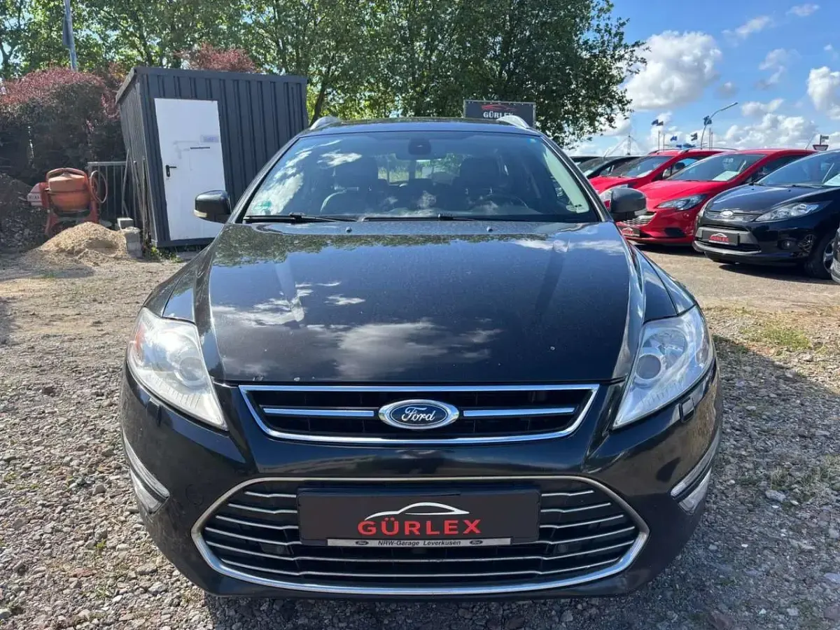 Gebraucht Ford Mondeo Titanium 163 PS (119 kW) 2014 Pantherschwarz metallic Kombi