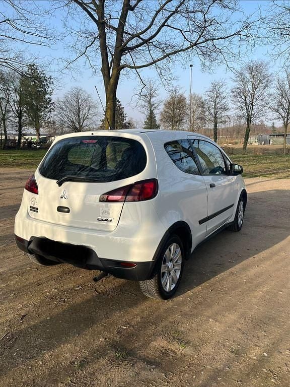 Gebraucht Mitsubishi Colt 95 PS (69 kW) 2010 Weiß Kleinwagen