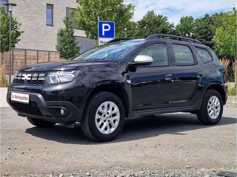 Schwarz (metallic) Gebraucht 2023 Dacia Duster SUV | 15.700 € (Guter Preis) - Bild 1/4