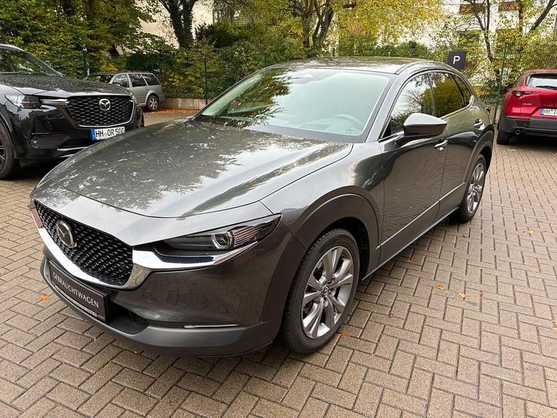 Grau Gebraucht 2025 Mazda CX-30 Exclusive-Line SUV | 26.950 € - Bild 1/4