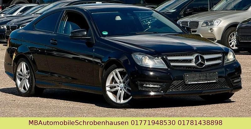 Schwarz Gebraucht 2014 Mercedes C220 Premium Coupé | 14.999 € - Bild 1/3