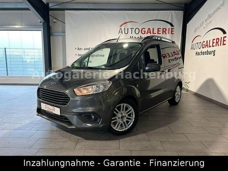 Grau Gebraucht 2018 Ford Tourneo Courier Titanium Van / Kleinbus | 10.990 € (Fairer Preis) - Bild 1/4