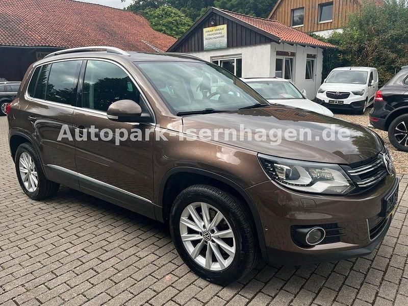 Braun Gebraucht 2013 VW Tiguan Sportline SUV | 11.499 € (Guter Preis) - Bild 1/4