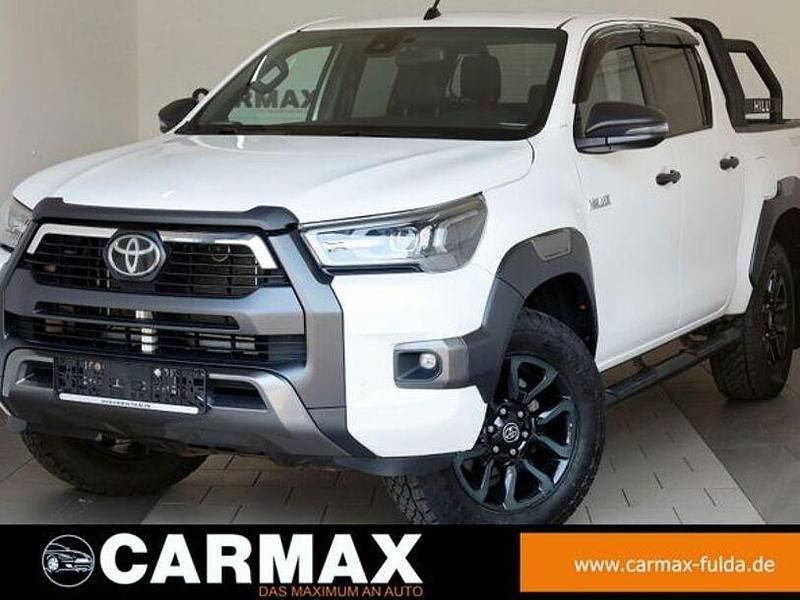 Weiss (metallic) Gebraucht 2021 Toyota HiLux Abholung | 41.600 € (Fairer Preis) - Bild 1/4