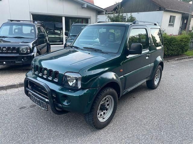 Grün Gebraucht 2003 Suzuki Jimny SUV | 9.900 € (Teuer) - Bild 1/4