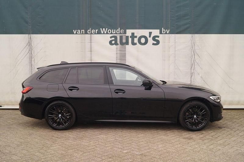 Gebraucht BMW 320e 163 PS (119 kW) 2022 Schwarz Kombi