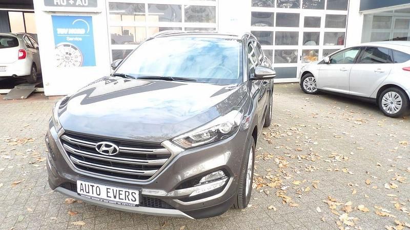 Grau Gebraucht 2018 Hyundai Tucson SUV | 13.450 € (Fairer Preis) - Bild 1/4