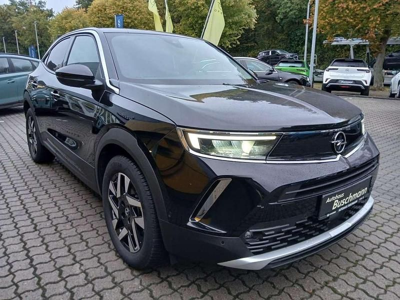 Gebraucht Opel Mokka-e Elegance 100 kW (136 PS) 2022 Karbon schwarz metallic SUV
