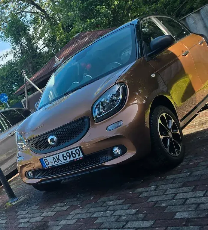 Gebraucht Smart ForFour Passion 75 PS (55 kW) 2015 Braun Kleinwagen