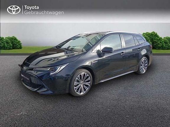 Black mica / ink Gebraucht 2021 Toyota Corolla Team Kombi | 22.580 € (Guter Preis) - Bild 1/4