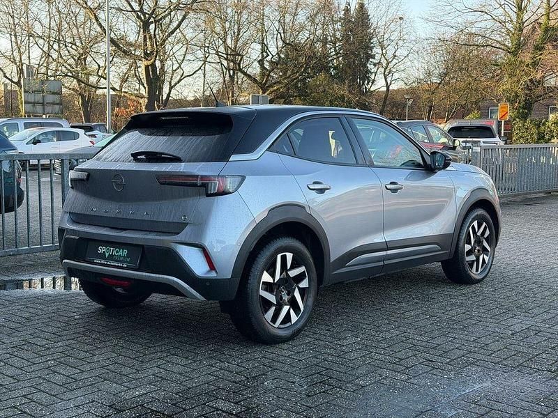 Gebraucht Opel Mokka-e Elegance 100 kW (136 PS) 2022 Quarz silber SUV