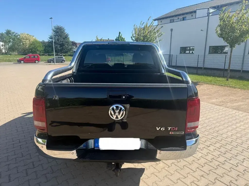 Second-hand VW Amarok 204 CP (150 kW) 2016 Negru Pickup
