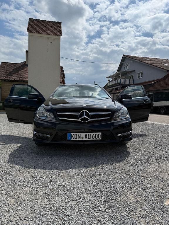 Schwarz Gebraucht 2014 Mercedes C220 Avantgarde Coupé | 18.600 € (Superpreis) - Bild 1/4