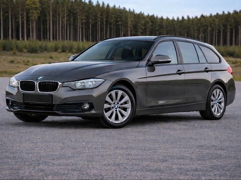 Grau Gebraucht 2016 BMW 318 Kombi | 9.899 € (Superpreis) - Bild 1/4