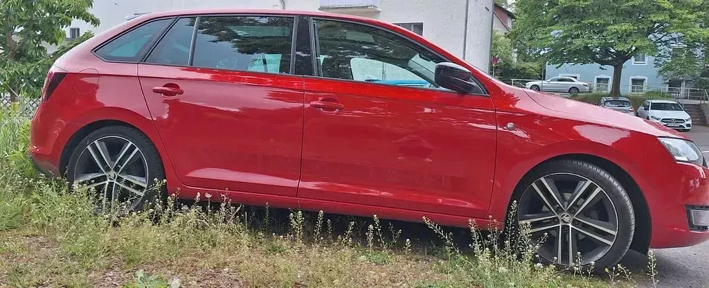 Używany Skoda Rapid Ambition 86 KM (63 kW) 2013 Czerwony Hatchback