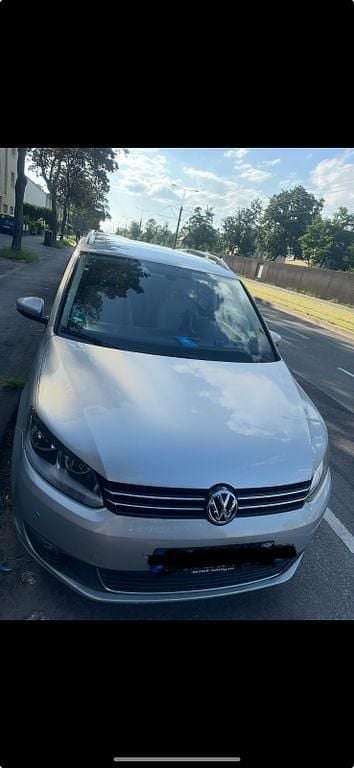 Grau Gebraucht 2010 VW Touran Van / Kleinbus | 6.650 € (Fairer Preis) - Bild 1/4