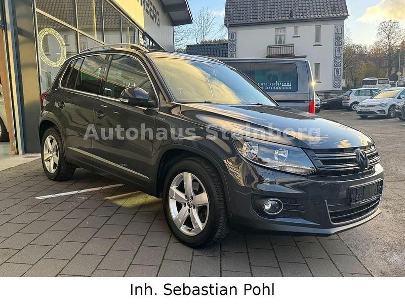 Grau Gebraucht 2016 VW Tiguan LOUNGE SUV | 12.499 € (Guter Preis) - Bild 1/4