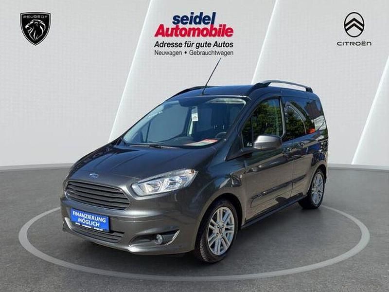 Grau Gebraucht 2019 Ford Tourneo Courier Titanium Van / Kleinbus | 13.885 € (Fairer Preis) - Bild 1/4