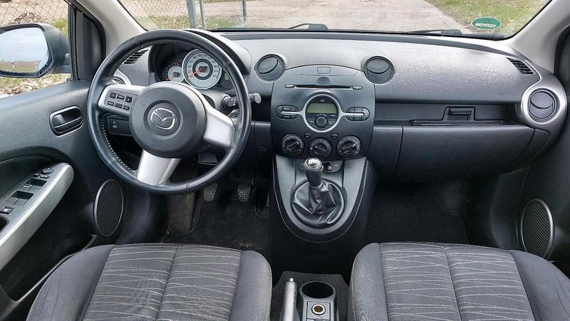 Gebraucht Mazda 2 75 PS (55 kW) 2009 Schwarz Kleinwagen