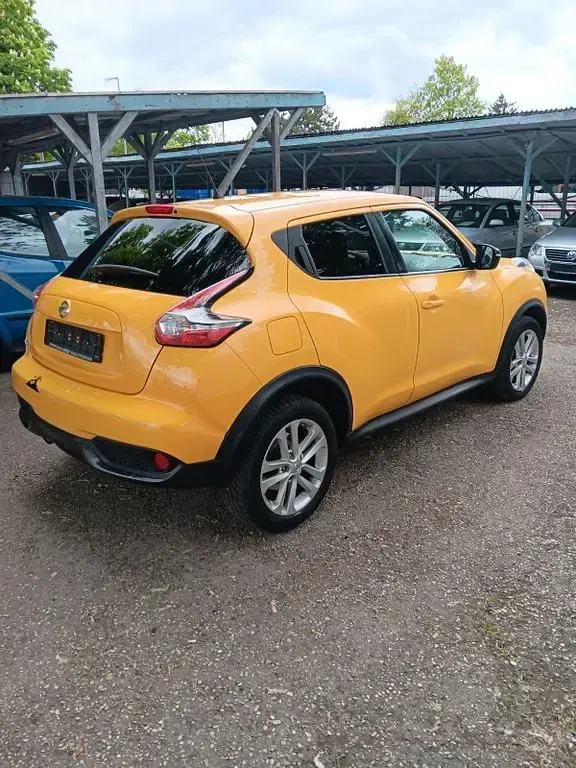 Gebraucht Nissan Juke Acenta 116 PS (85 kW) 2015 Gelb SUV