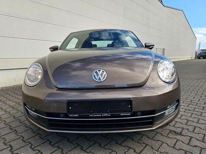 Gebraucht VW Beetle Design 105 PS (77 kW) 2012 Toffeebraun metallic Kleinwagen