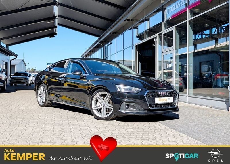 Black metallic Gebraucht 2021 Audi A5 Sportback Sport Limousine | 33.650 € (Fairer Preis) - Bild 1/4