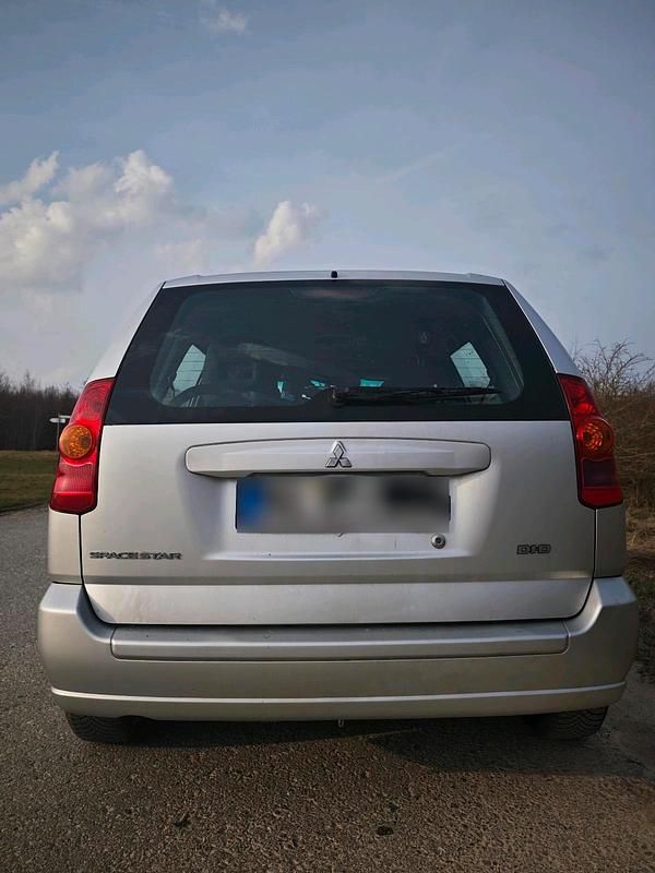Second-hand Mitsubishi Space Star 115 CP (84 kW) 2005 Argintiu Hatchback