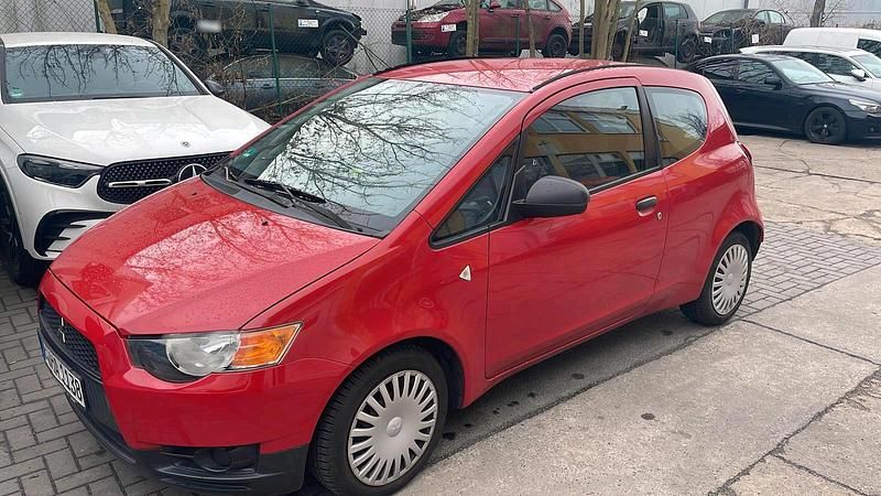 Gebraucht Mitsubishi Colt 75 PS (55 kW) 2009 Rot Kleinwagen