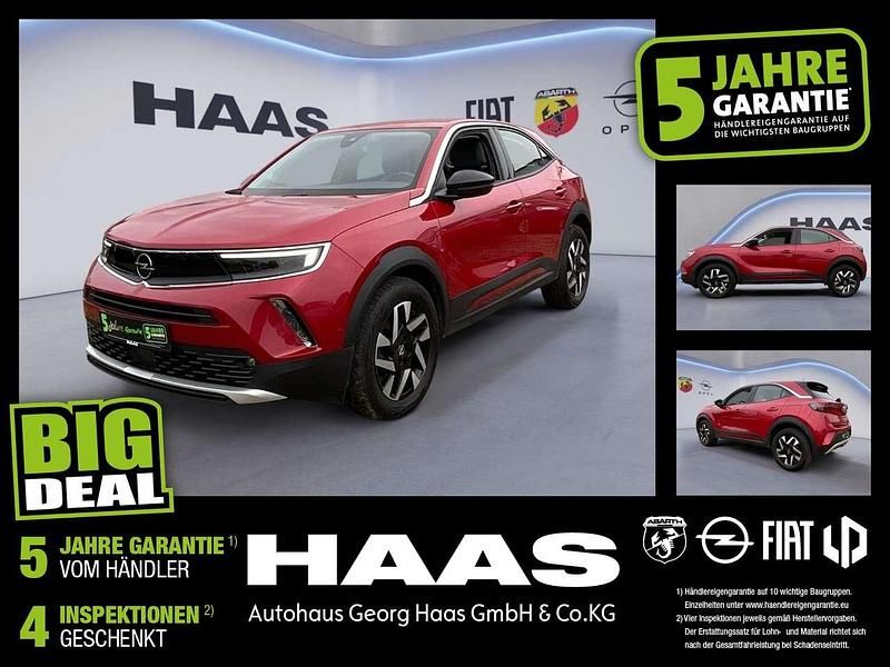 Power rot/kosmos rot Gebraucht 2022 Opel Mokka SUV | 17.490 € (Guter Preis) - Bild 1/4