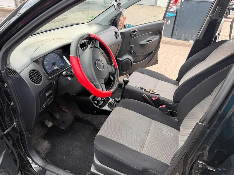 Gebraucht Daihatsu Cuore Plus 58 PS (42 kW) 2005 Schwarz Kleinwagen
