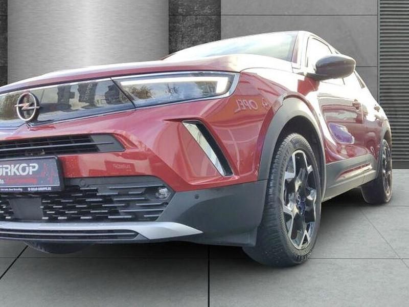 Gebraucht Opel Mokka-e Ultimate 100 kW (136 PS) 2023 Power rot/kosmos rot SUV