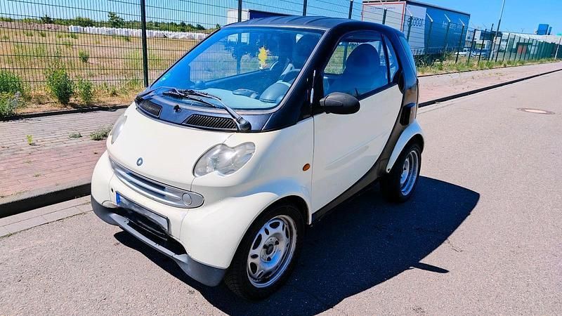 Andere außenfarben Gebraucht 2003 Smart ForTwo Coupé Kleinwagen | 2.050 € (Fairer Preis) - Bild 1/4