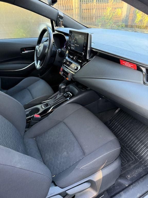 Grau Gebraucht 2022 Toyota Corolla Comfort Kombi | 15.999 € (Superpreis) - Bild 1/4