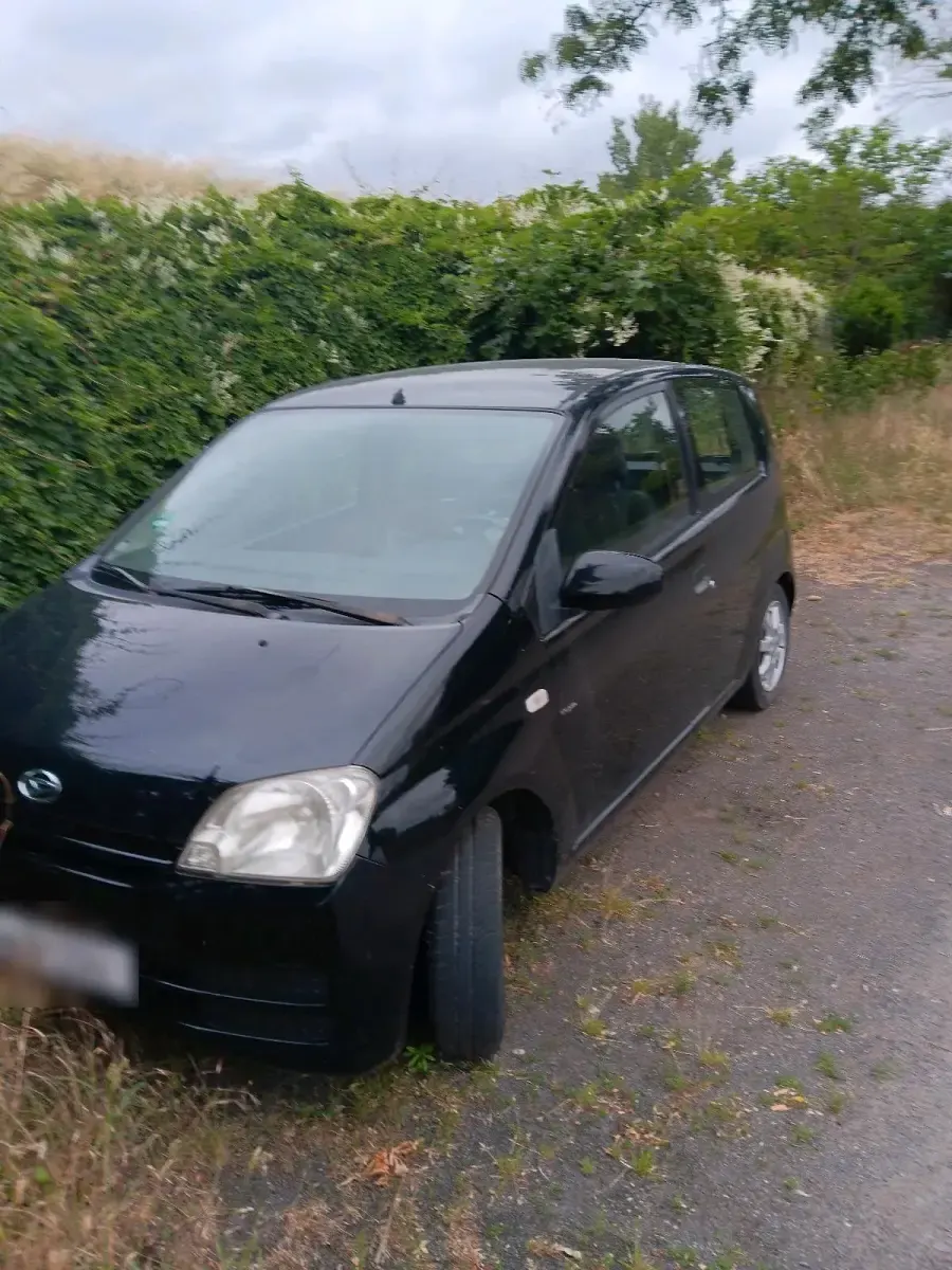Gebraucht Daihatsu Cuore 58 PS (42 kW) 2006 Schwarz Kleinwagen