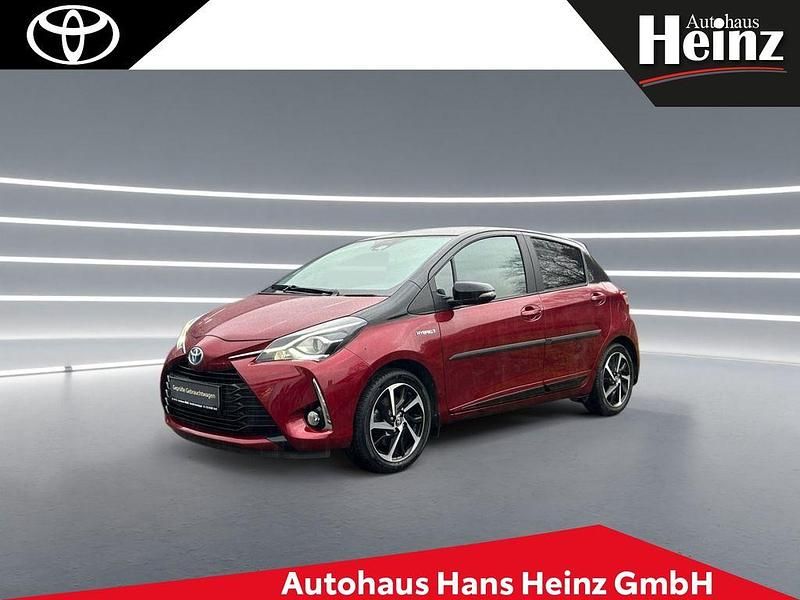 Tokiorot perleffekt / mysticschwarz mica Gebraucht 2019 Toyota Yaris Hybrid Basis Limousine | 15.450 € (Fairer Preis) - Bild 1/4