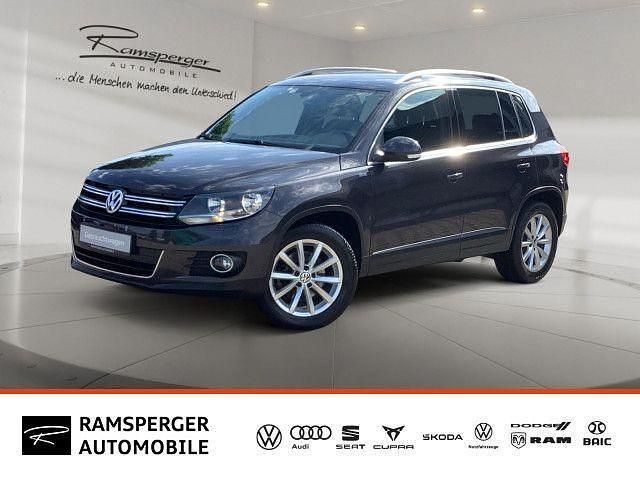 Grau (kryptongrau metallic) Gebraucht 2015 VW Tiguan LOUNGE SUV | 12.990 € (Guter Preis) - Bild 1/4