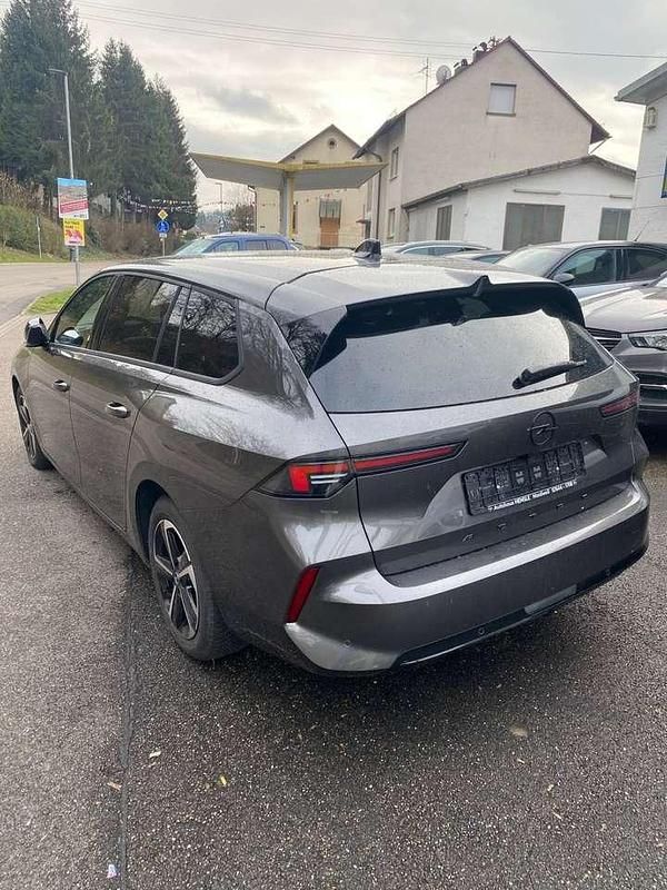 Gebraucht Opel Astra 131 PS (96 kW) 2024 Vulkangrau Kombi