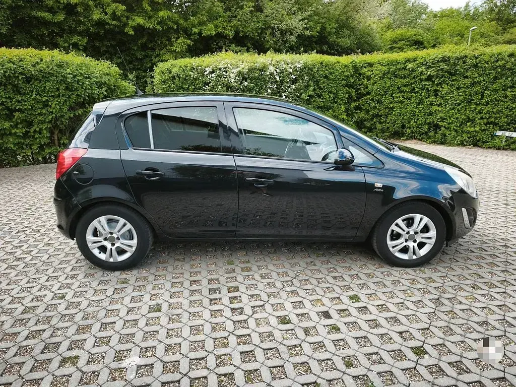 Gebraucht Opel Corsa Active 95 PS (69 kW) 2013 Schwarz Kleinwagen