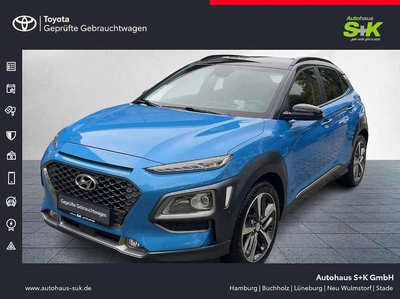 Blue lagoon / phantom black / mic (schwarz) Gebraucht 2018 Hyundai Kona Premium SUV | 14.460 € (Etwas zu teuer) - Bild 1/4