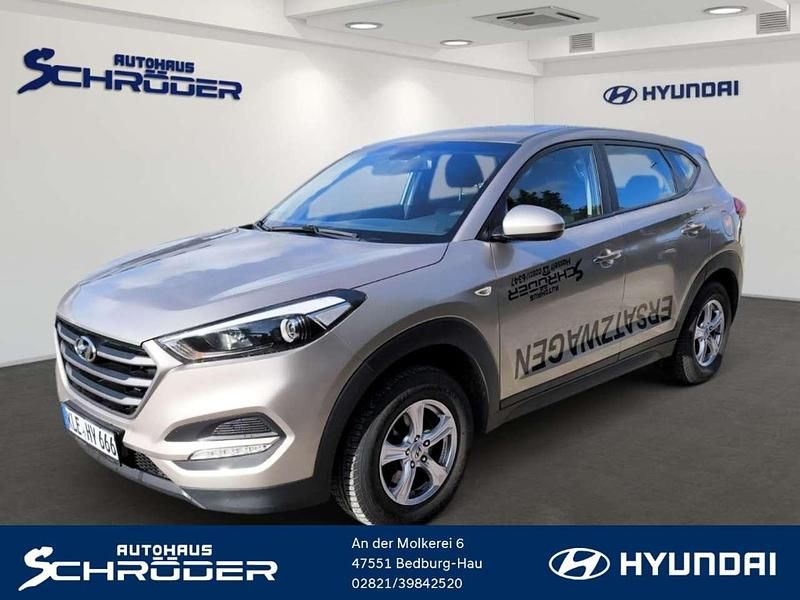 White sand / met Gebraucht 2018 Hyundai Tucson Classic SUV | 19.990 € - Bild 1/4